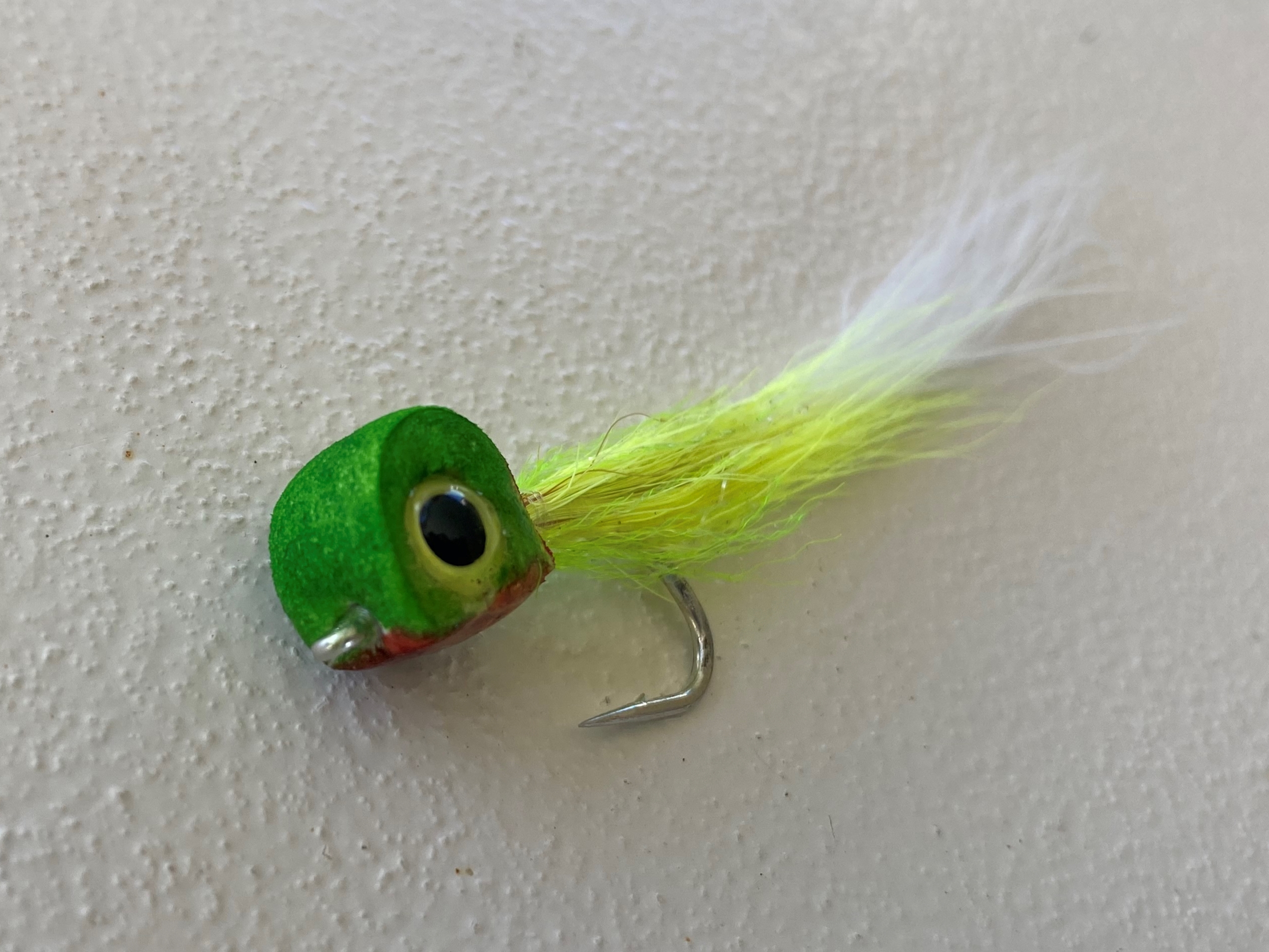 a floating minnow fly in the color chartreuce