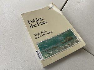 A worn fishing book
