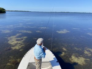 A fly angler surveys the flats as he prepares to fly fish in Sarasota, FL